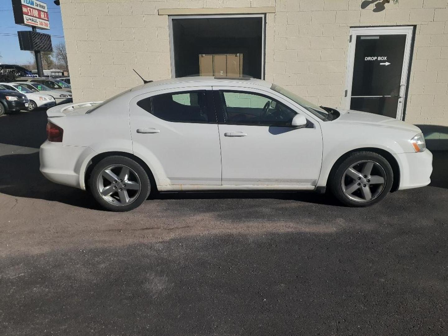 2012 Dodge Avenger SXT (1C3CDZEG0CN) with an 3.6L V6 DOHC 24V engine, 6-Speed Automatic transmission, located at 2015 Cambell Street, Rapid City, SD, 57701, (605) 342-8326, 44.066433, -103.191772 - Photo#1